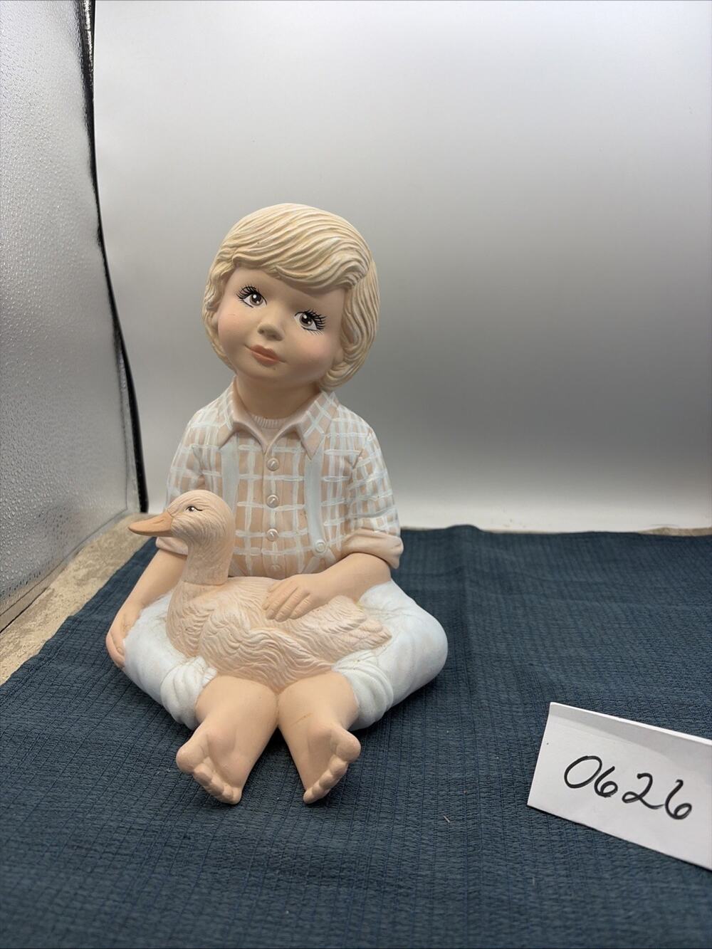 Vintage Beautiful Porcelain/ Ceramic Boy Holding a Goose 10” X 7”